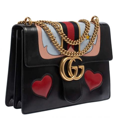 gucci black purse with heart on back|gucci marmont small shoulder bag.